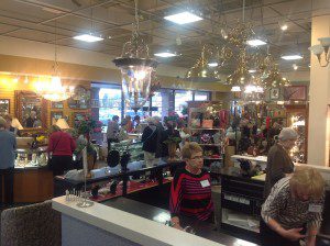 Customers hunting for treasure in a consignment shop