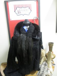 Fur coat on a mannequin with vintage boots