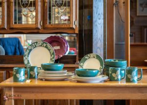 Matching dinnerware set with plates, bowls, and mugs